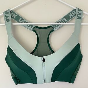 Adidas medium support sports bra. Green/pistachio color. Zipper front. Size S.